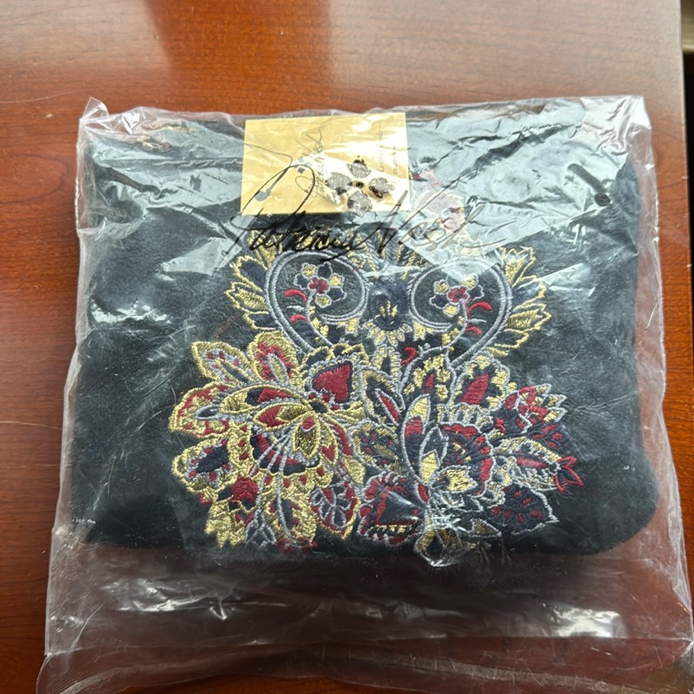 Patricia Nash Wristlet. NWT. Stored in original packaging. Navy leather.